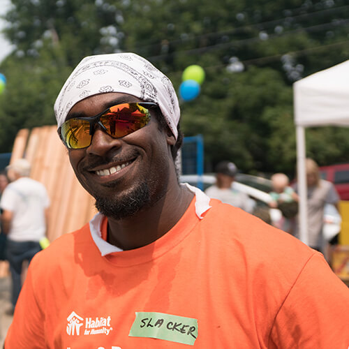 Volunteer smiling